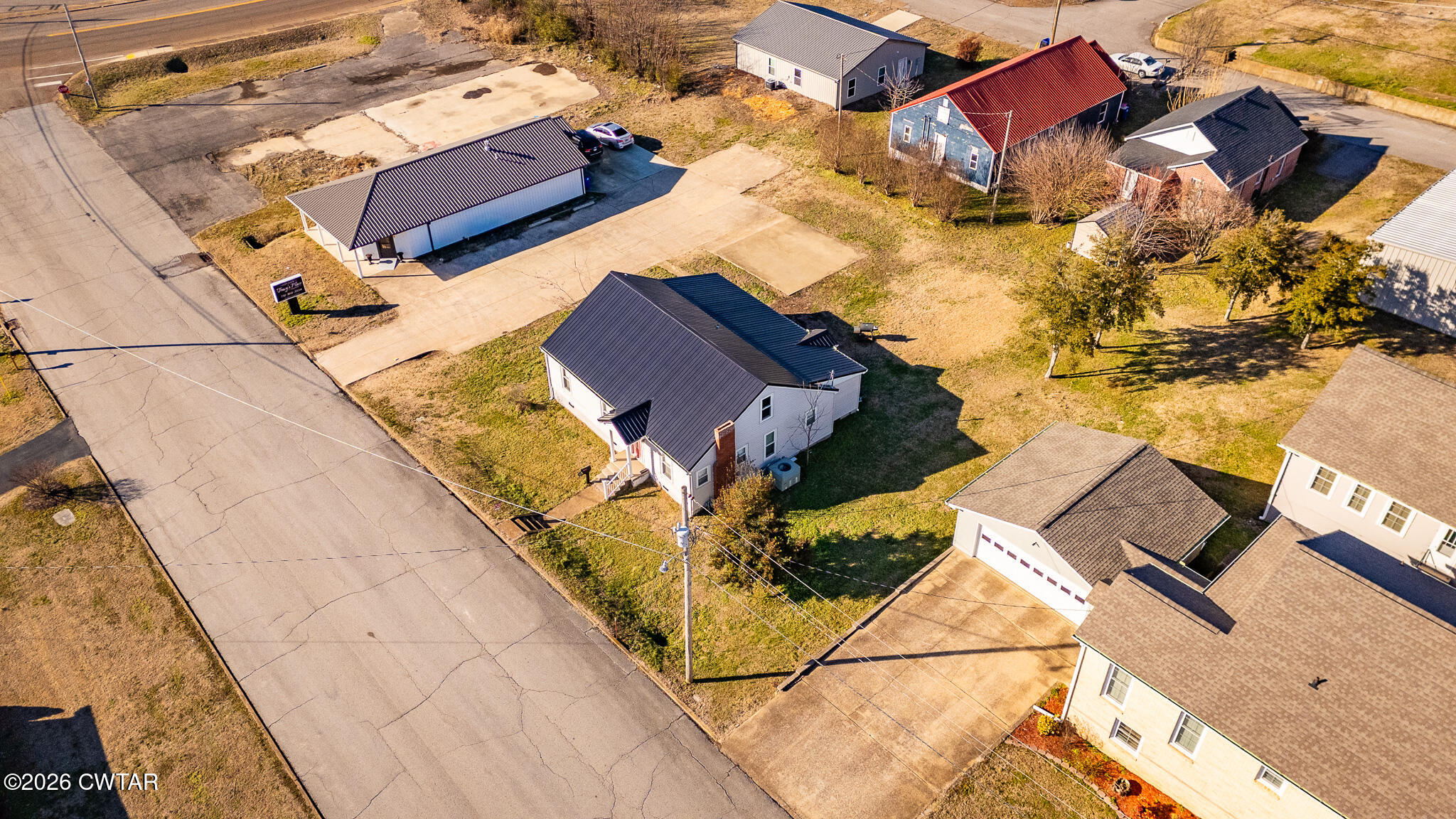 150 West Locust Street Dresden, TN 38225 - Photo 3 of 31 an aerial view of a house with swimming pool
