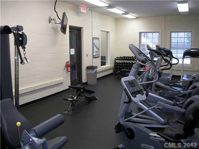 1204 Screech Owl Road Waxhaw, NC 28173 - Photo 12 of 16 a view of a room with gym equipment