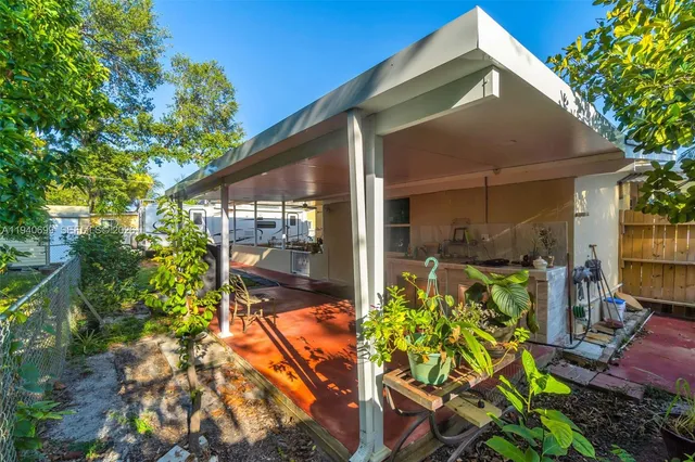 a view of backyard with tree