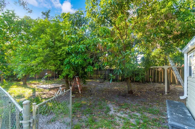 a view of outdoor space and yard