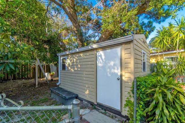 a view of a pathway with a yard