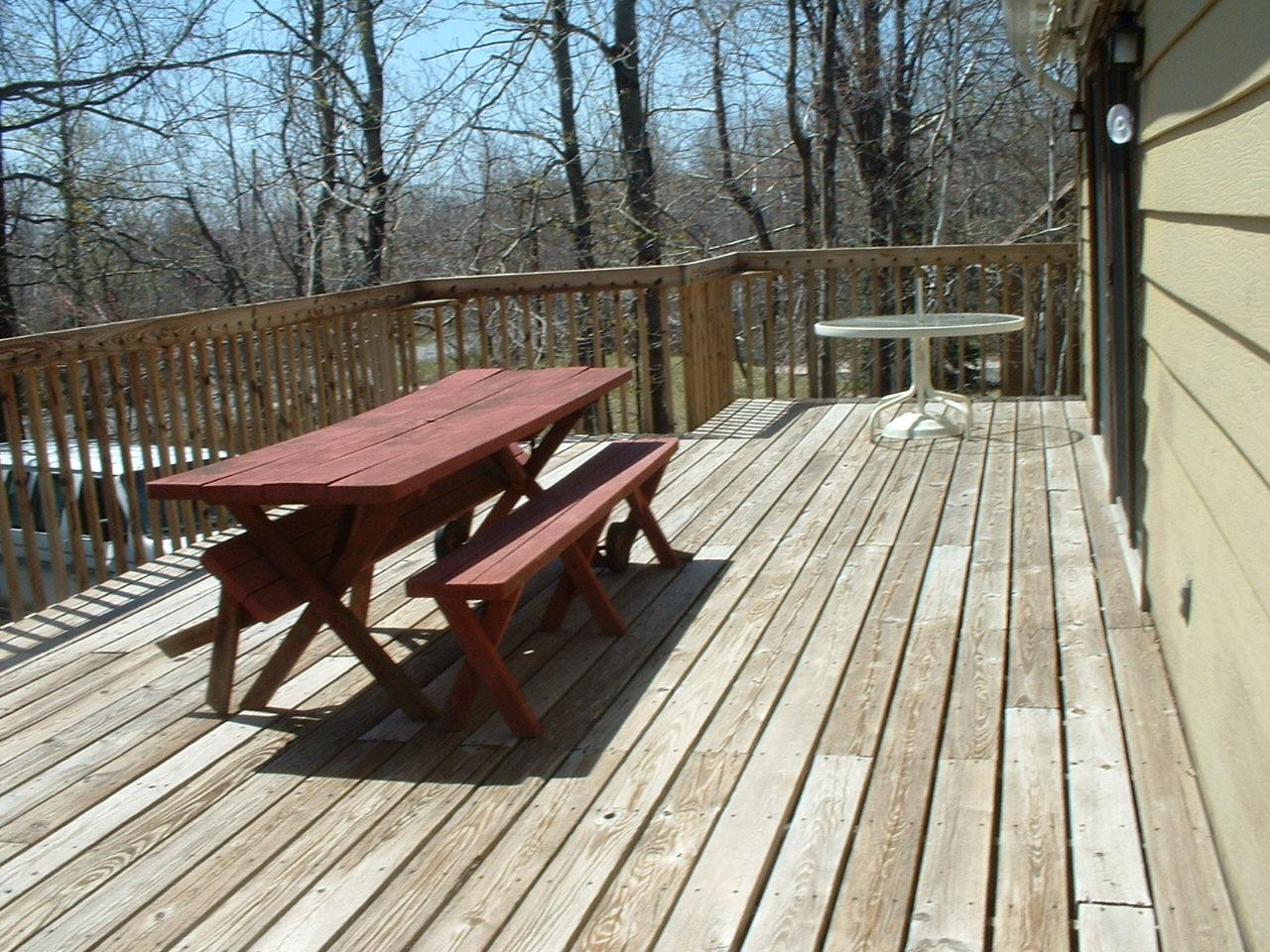 65 Buck Hill Road Blakeslee, PA 18610 - Photo 15 of 16 a view of balcony with wooden floor and outdoor seating