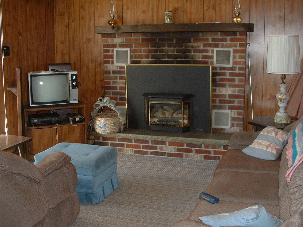 65 Buck Hill Road Blakeslee, PA 18610 - Photo 5 of 16 a living room with furniture and a fireplace