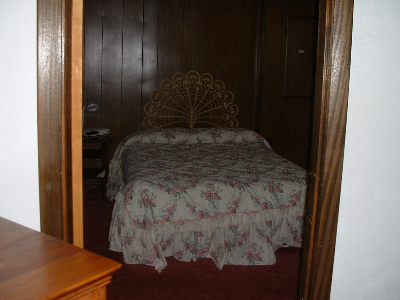 65 Buck Hill Road Blakeslee, PA 18610 - Photo 7 of 16 a bedroom with a bed and a dresser