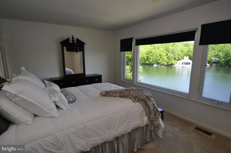 2013 Chadds Ford Drive Reston, VA 20191 - Photo 21 of 24 Master bedroom with sweeping lake views.