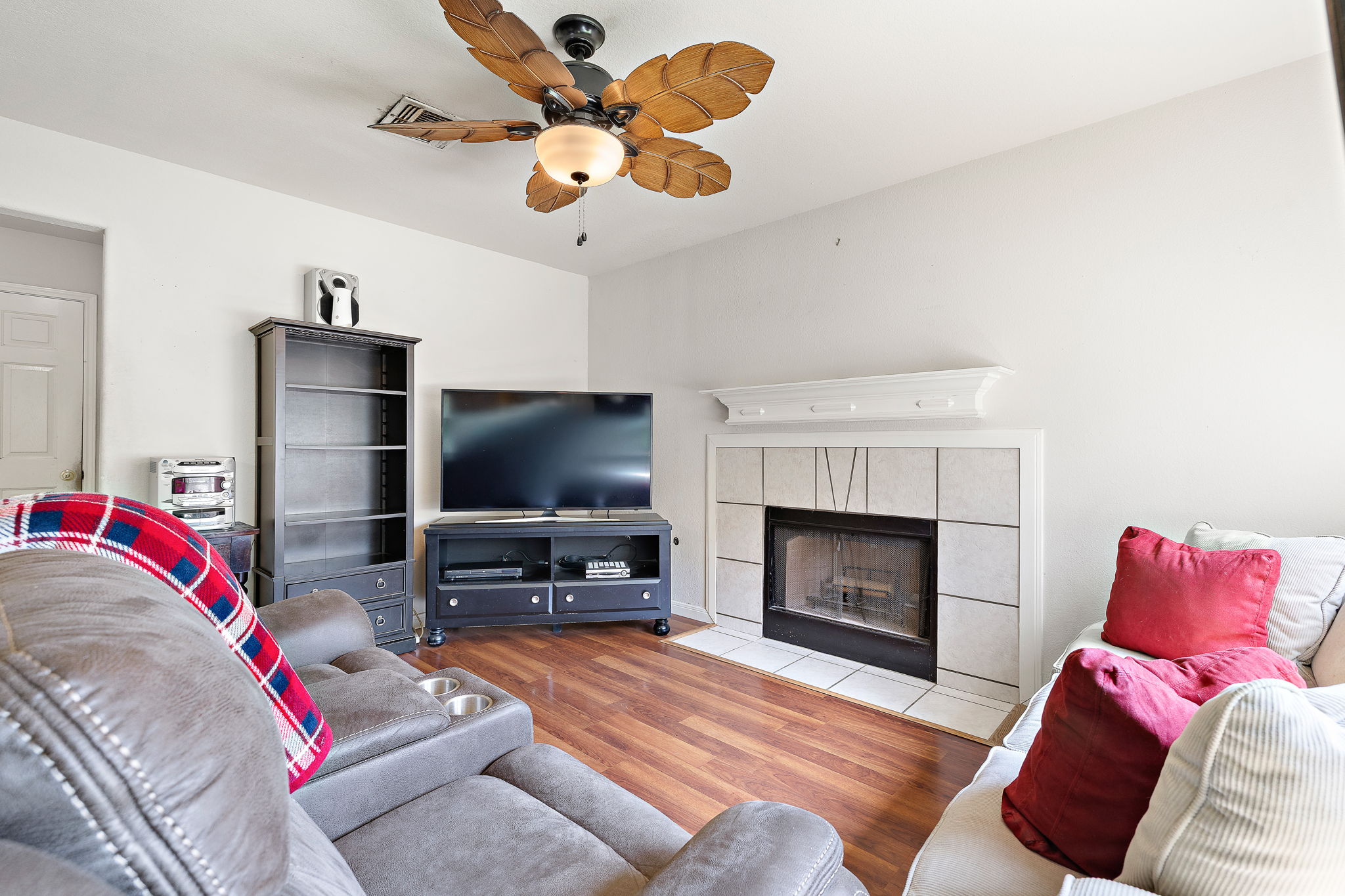 615 Runners Ridge Pflugerville, TX 78660 - Photo 16 of 32 a living room with furniture and a fireplace