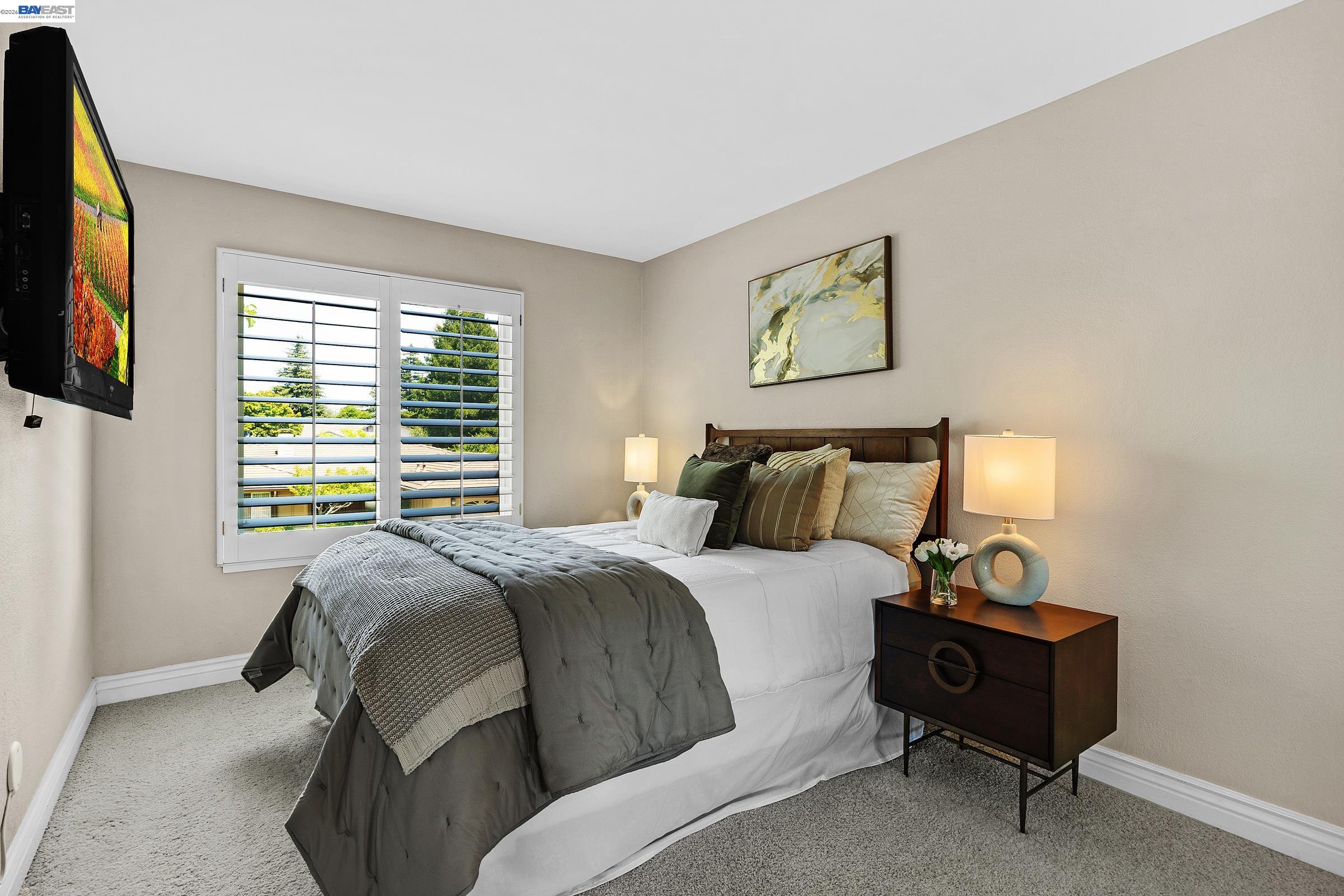 17 Suva Court San Ramon, CA 94582 - Photo 22 of 47 a bedroom with a bed and a television