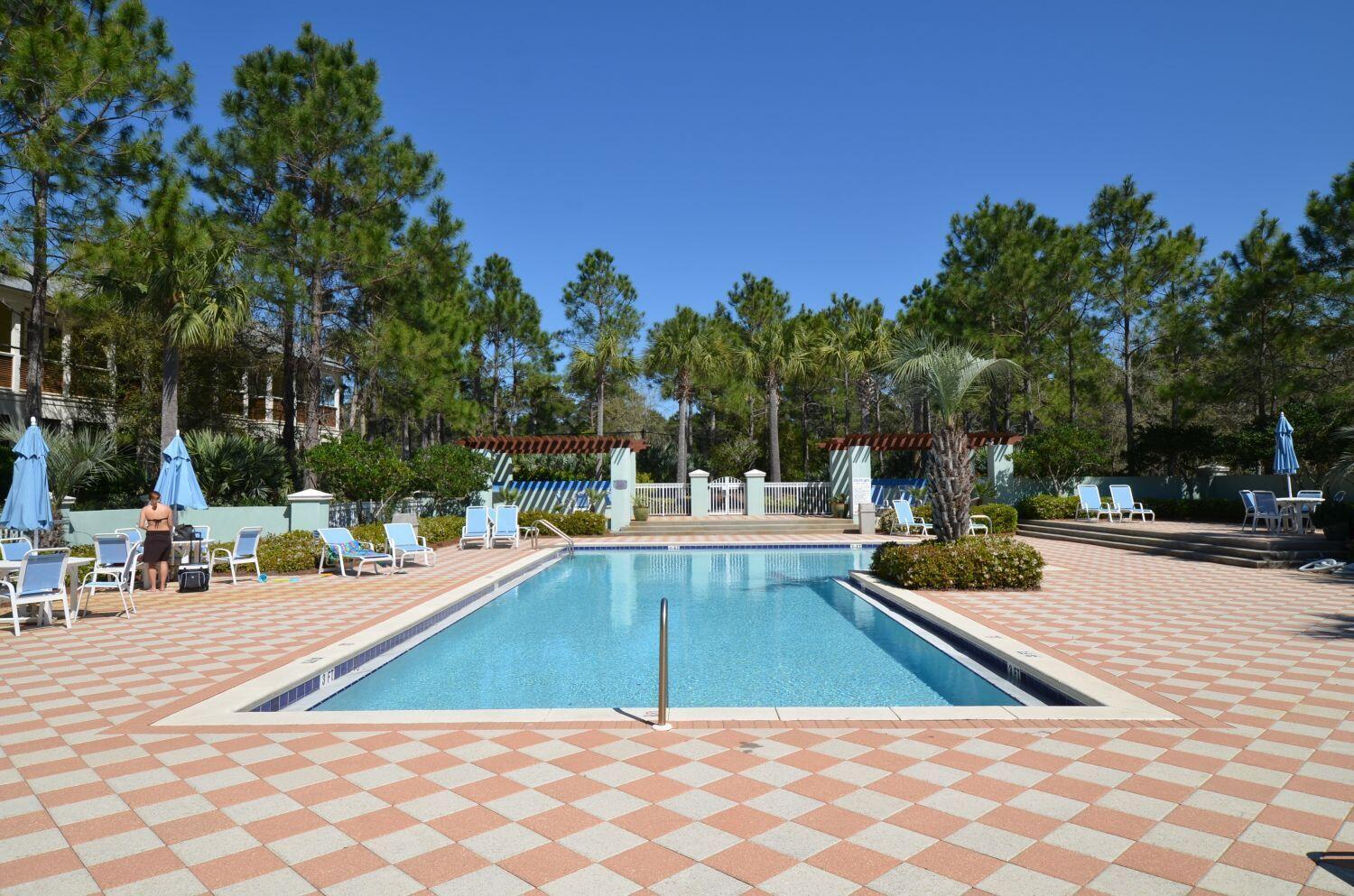 95 Laura Hamilton Boulevard, Unit 209 Santa Rosa Beach, FL 32459 - Photo 29 of 37 a view of swimming pool with chairs