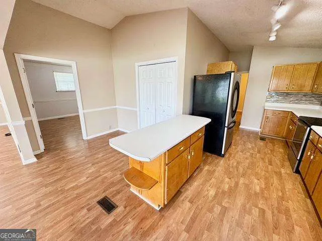 a living room with a couch and a table