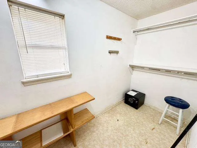 a room with storage and utility