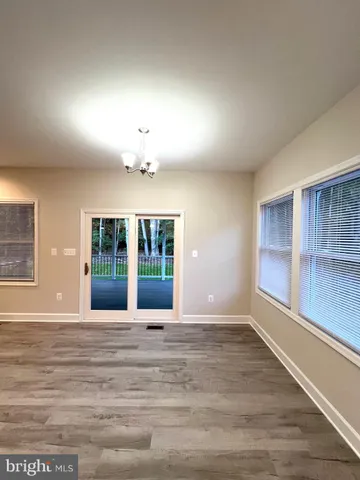 a picture of a room with a door