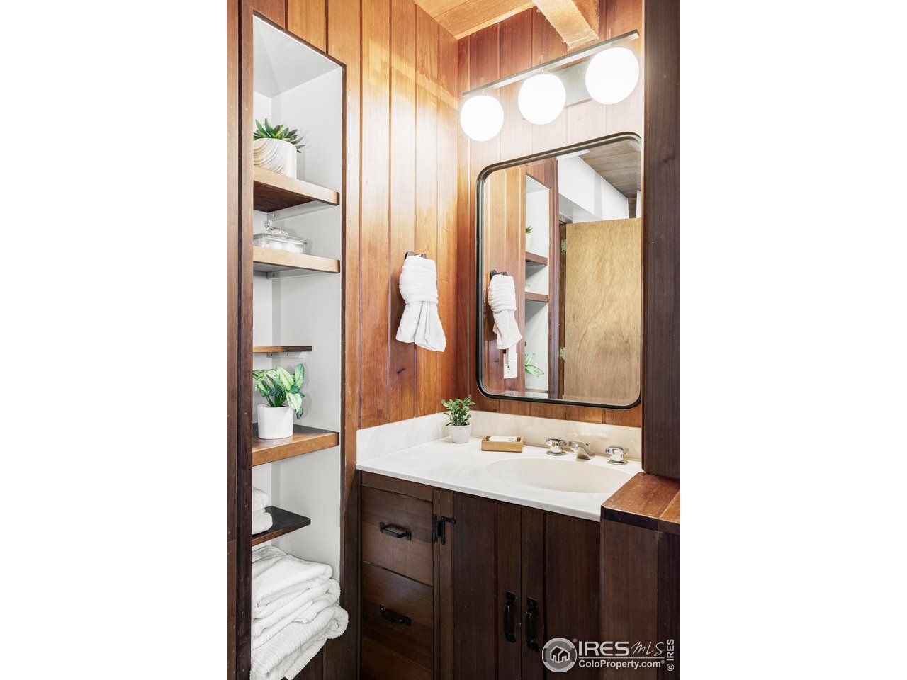 279 Forrest Lane Boulder, CO 80302 - Photo 18 of 36 a bathroom with a sink and a mirror