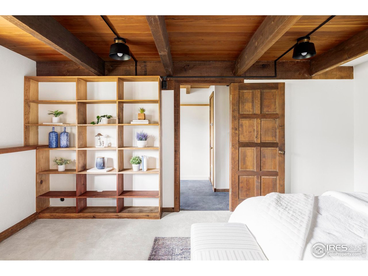 279 Forrest Lane Boulder, CO 80302 - Photo 23 of 36 a bed room with a bed and a window