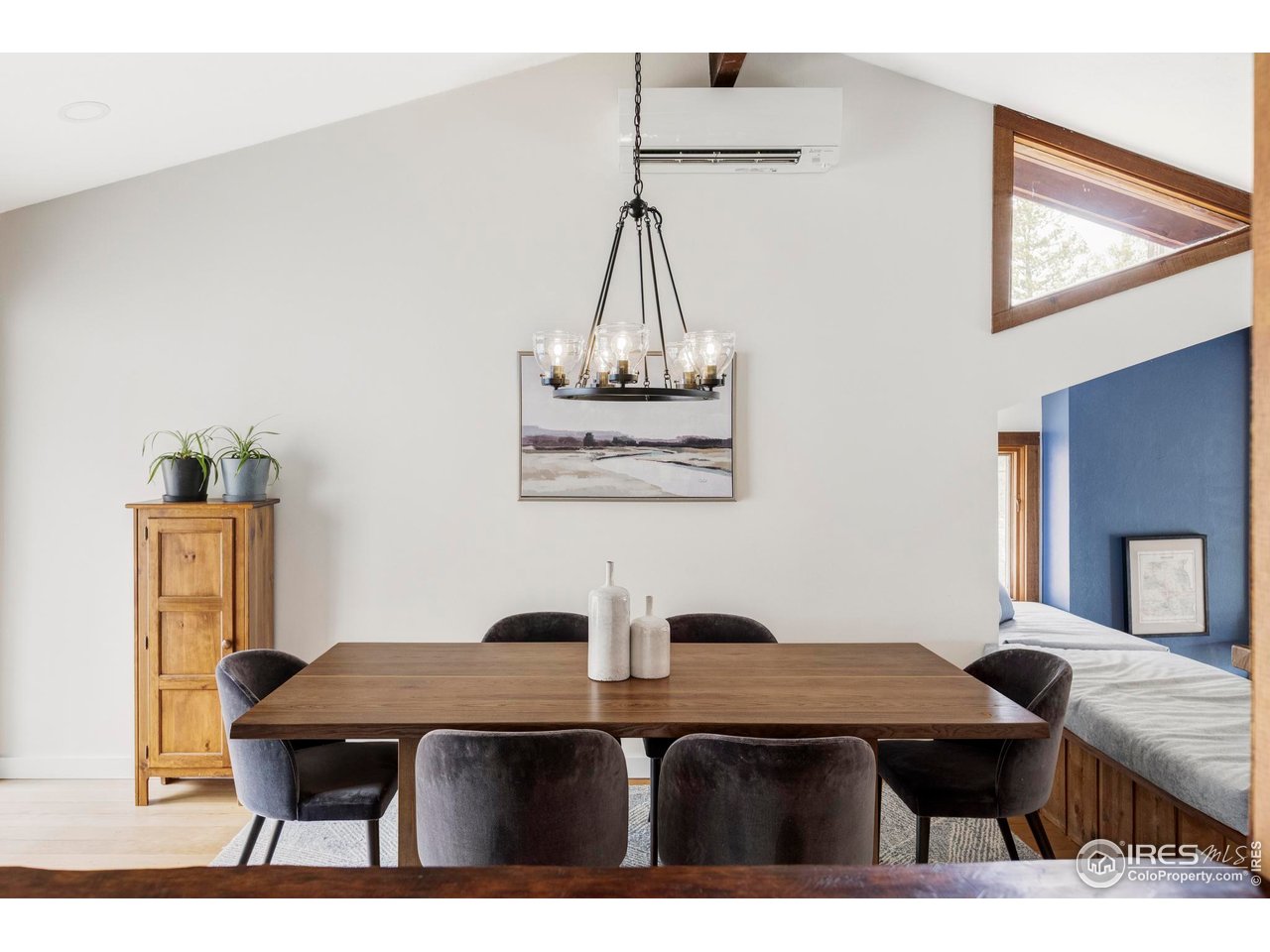 279 Forrest Lane Boulder, CO 80302 - Photo 7 of 36 a view of a dining room with furniture and wooden floor