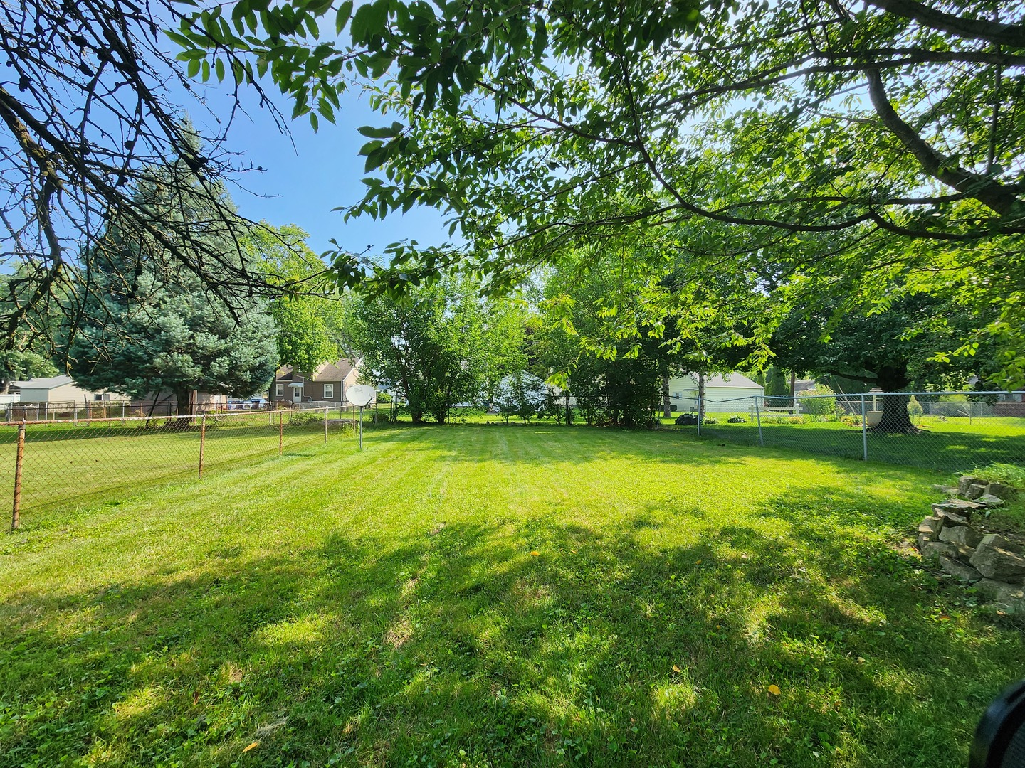 1354 Circle Drive Kankakee, IL 60901 - Photo 11 of 14 a view of outdoor space with deck and trees
