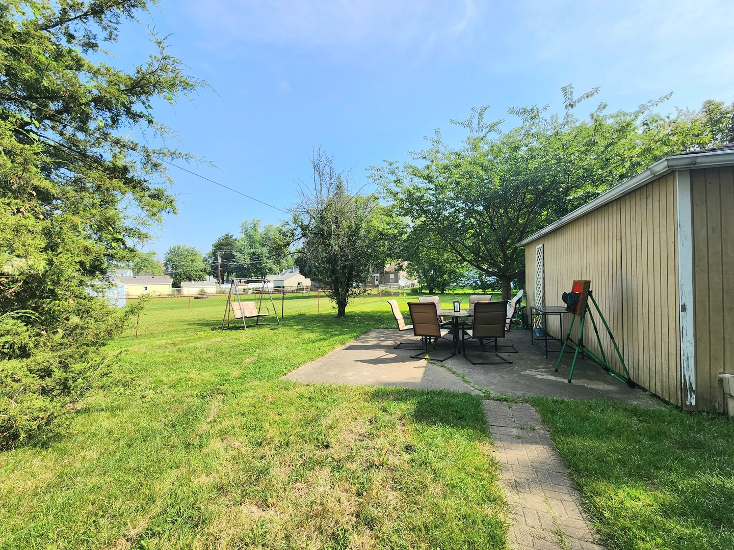 1354 Circle Drive Kankakee, IL 60901 - Photo 13 of 14 a view of a house with backyard and sitting area