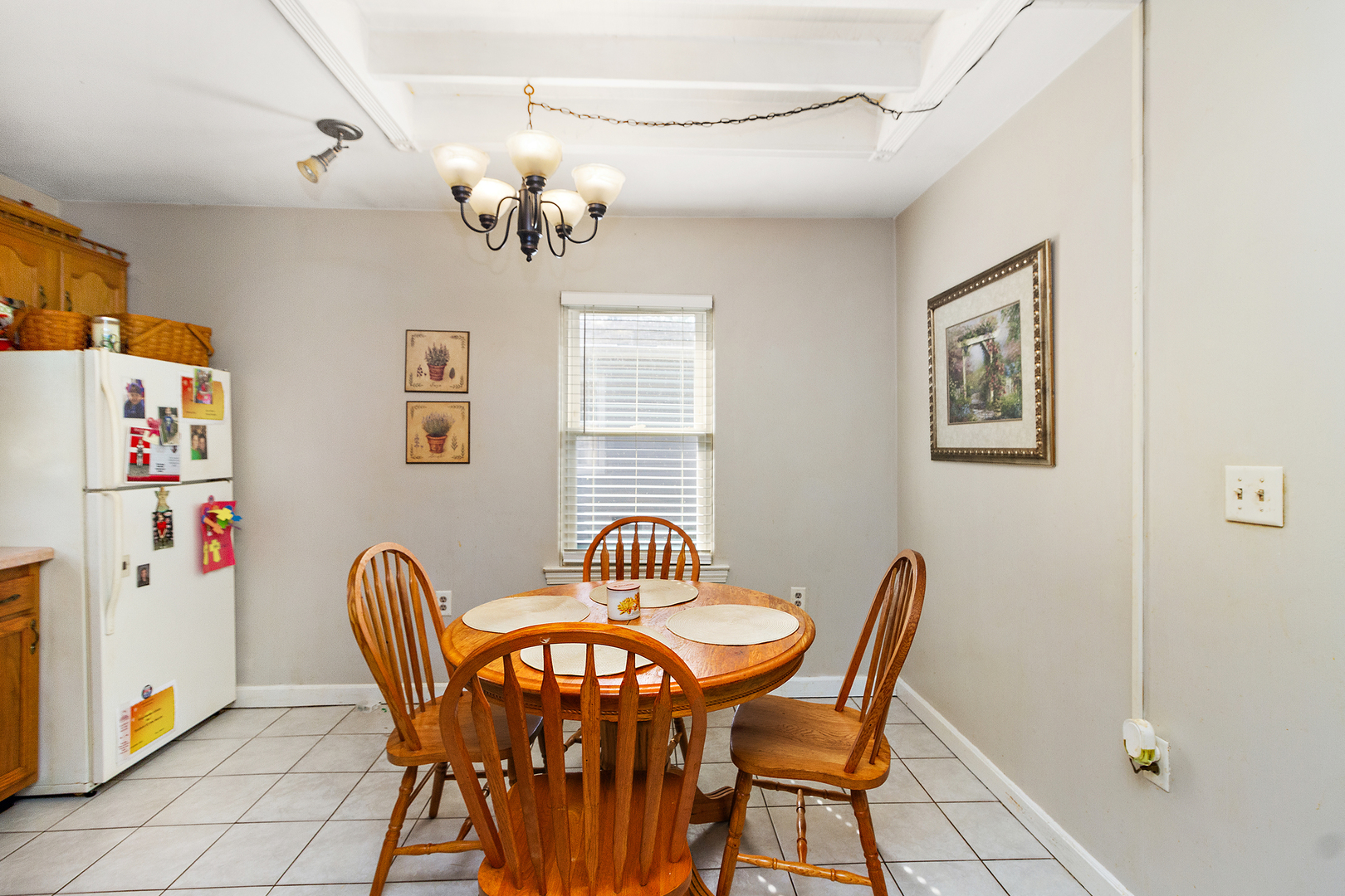 1354 Circle Drive Kankakee, IL 60901 - Photo 3 of 14 a dining room with furniture and chandelier