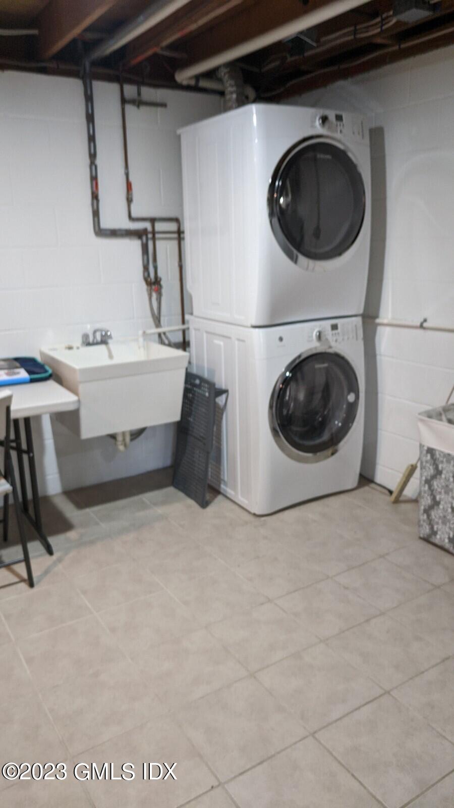 66 Ute Place, Unit A Greenwich, CT 06830 - Photo 18 of 18 a utility room with dryer and washer