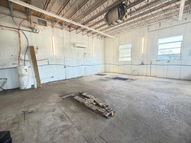1000 East Main Street Decherd, TN 37324 - Photo 14 of 18 a view of a room with wooden walls