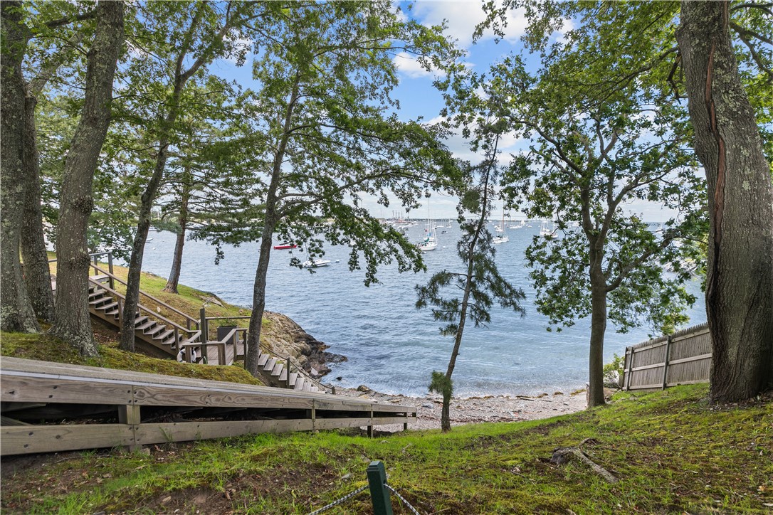 111 Harrison Avenue, Unit B4 Newport, RI 02840 - Photo 34 of 38 Kayak ramp to beach paddle board/kayak storage at top of hill