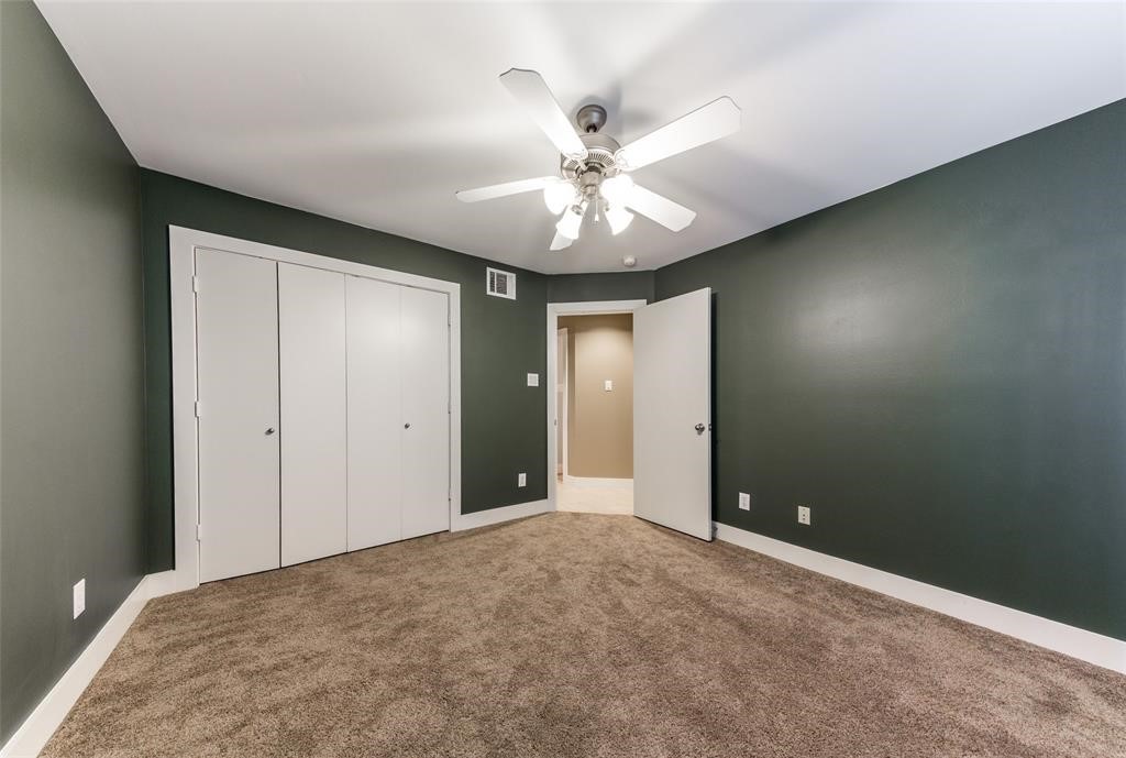 3027 Buttercup Street Houston, TX 77063 - Photo 24 of 29 a view of an empty room and chandelier fan