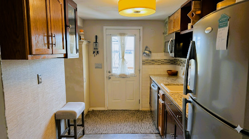 101 1/2 East North Street Danforth, IL 60930 - Photo 3 of 14 view of living room with furniture and a window