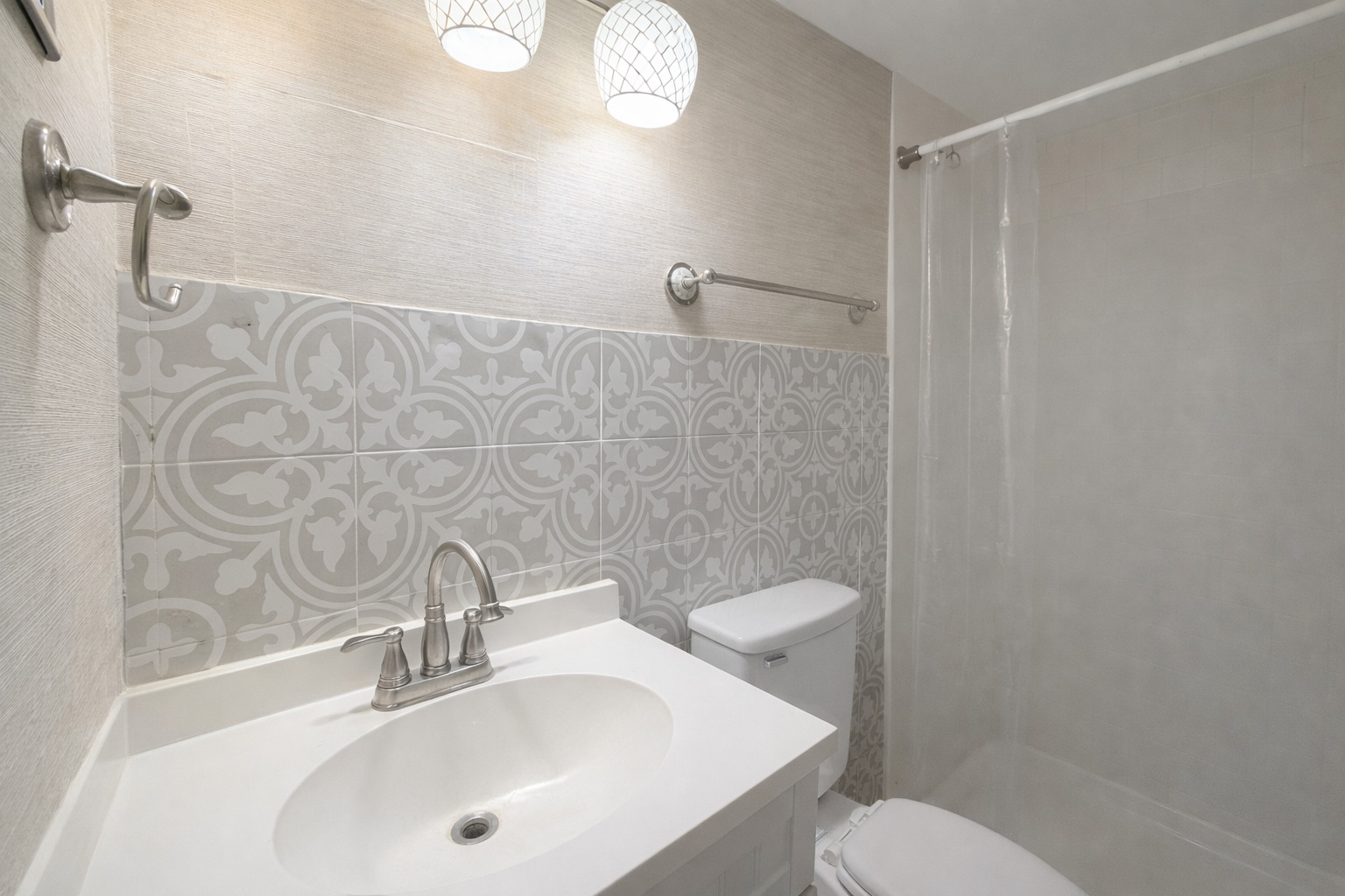 101 1/2 East North Street Danforth, IL 60930 - Photo 8 of 14 a bathroom with a sink mirror vanity and toilet