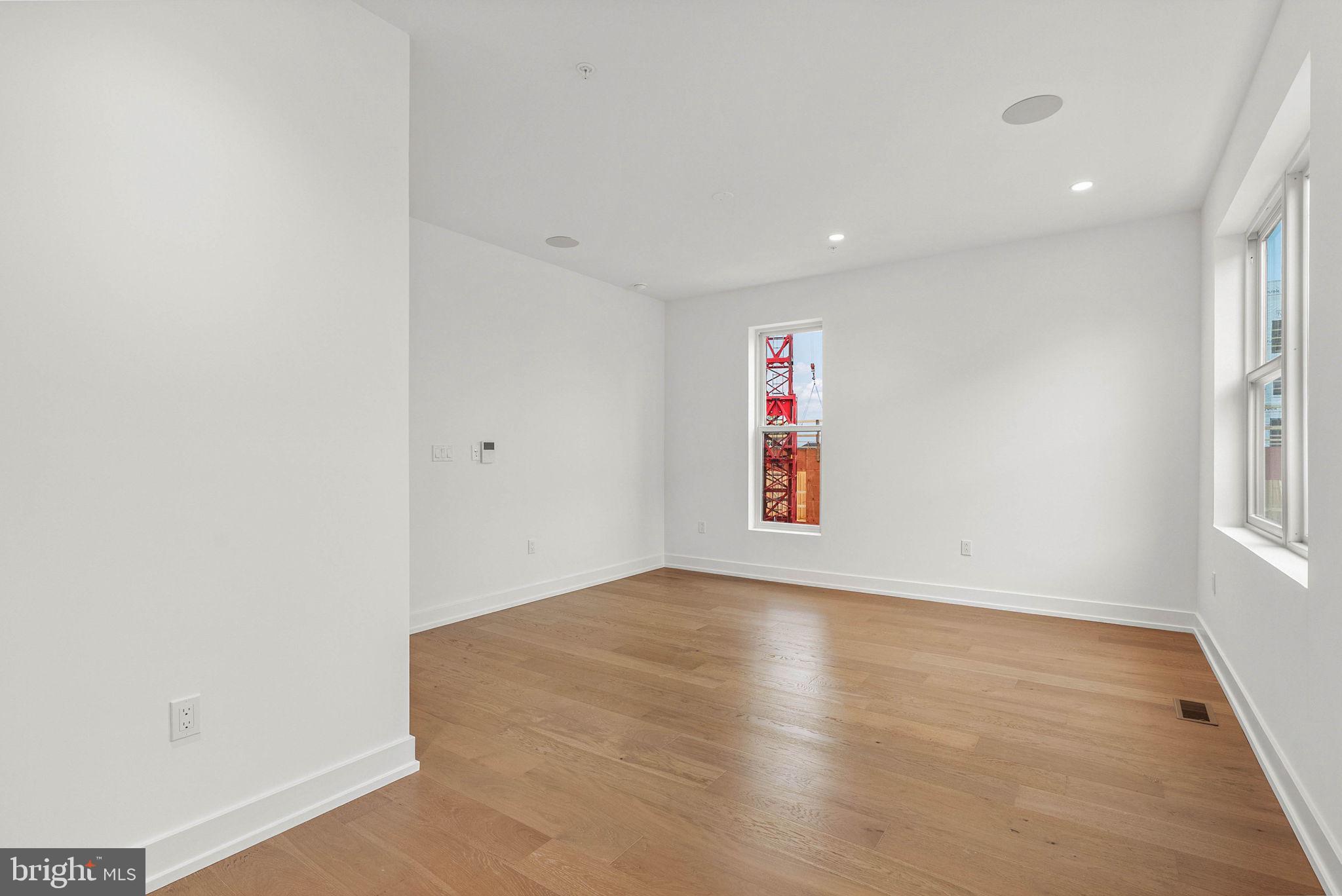 650 Fairmount Avenue, Unit A2 Philadelphia, PA 19123 - Photo 12 of 40 an empty room with windows