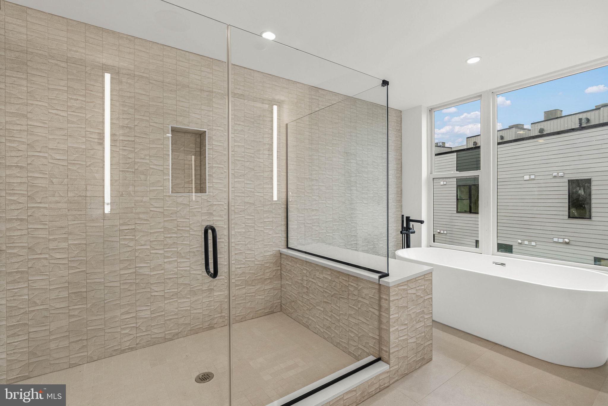 650 Fairmount Avenue, Unit A2 Philadelphia, PA 19123 - Photo 14 of 40 a bathroom with a shower and a sink