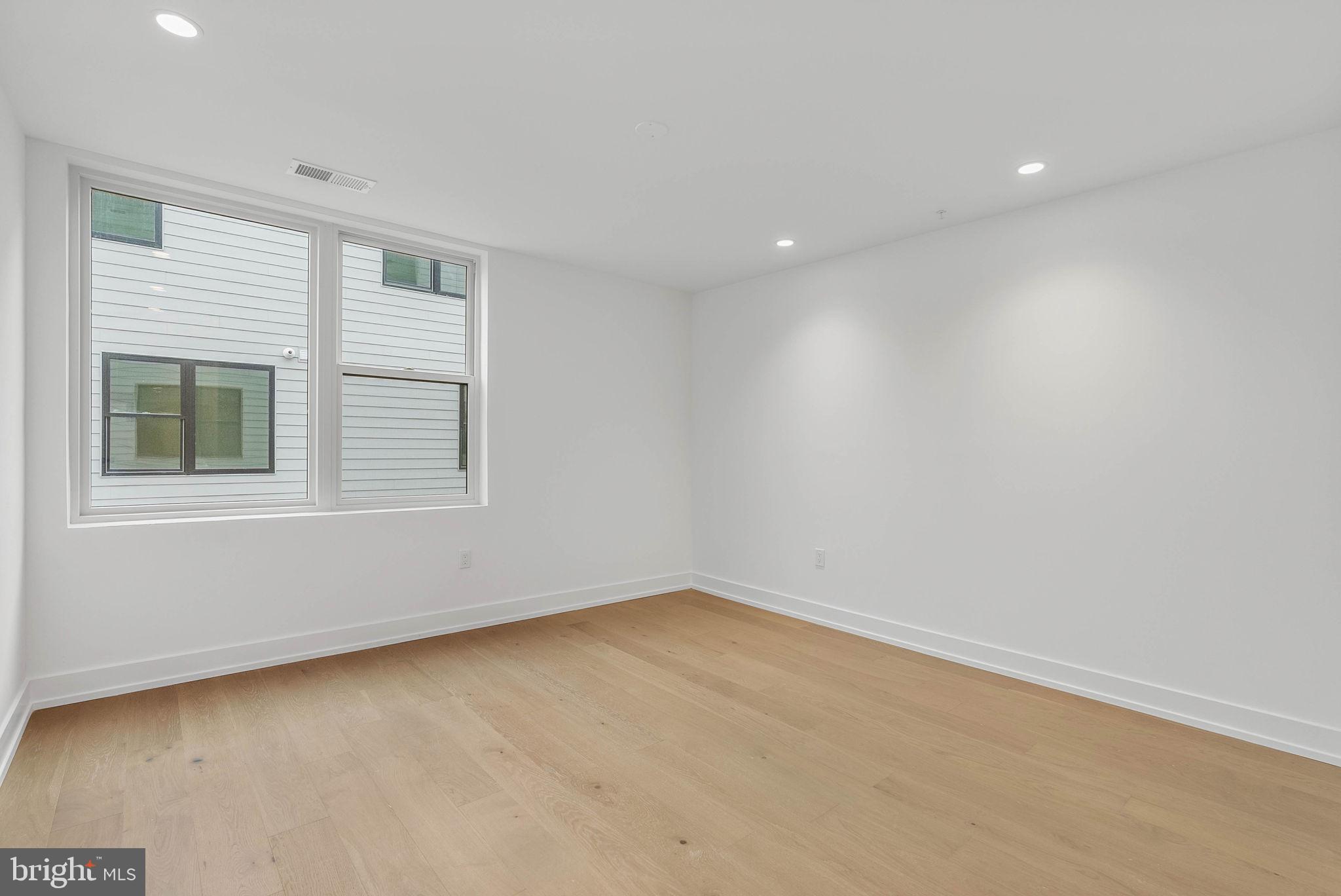 650 Fairmount Avenue, Unit A2 Philadelphia, PA 19123 - Photo 25 of 40 an empty room with a window