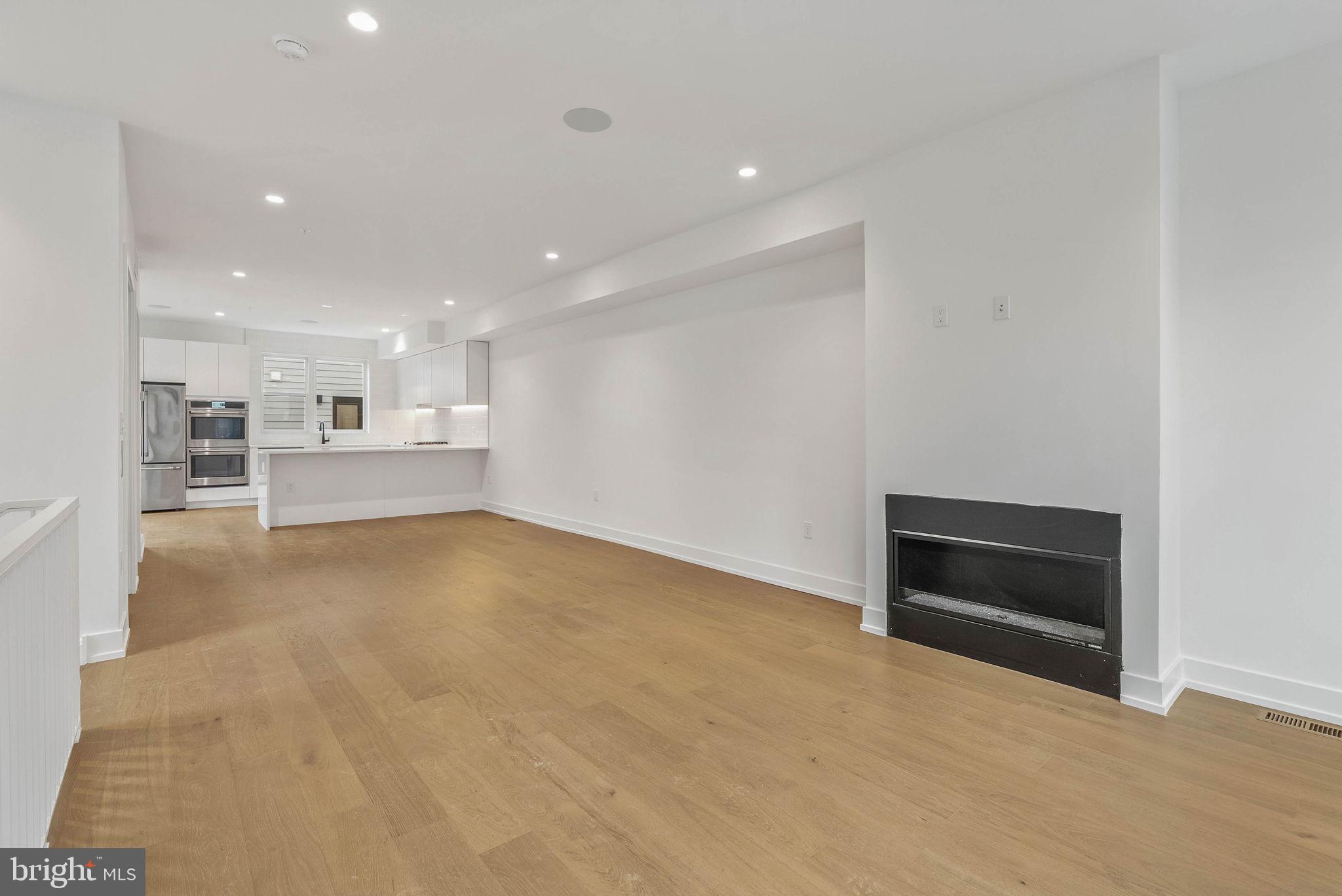 650 Fairmount Avenue, Unit A2 Philadelphia, PA 19123 - Photo 4 of 40 a view of an empty room with a kitchen