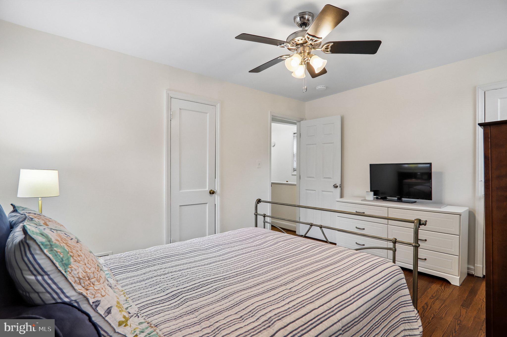 3103 Walnut Street Northeast Washington, DC 20018 - Photo 29 of 40 Cozy bedroom with modern charm.