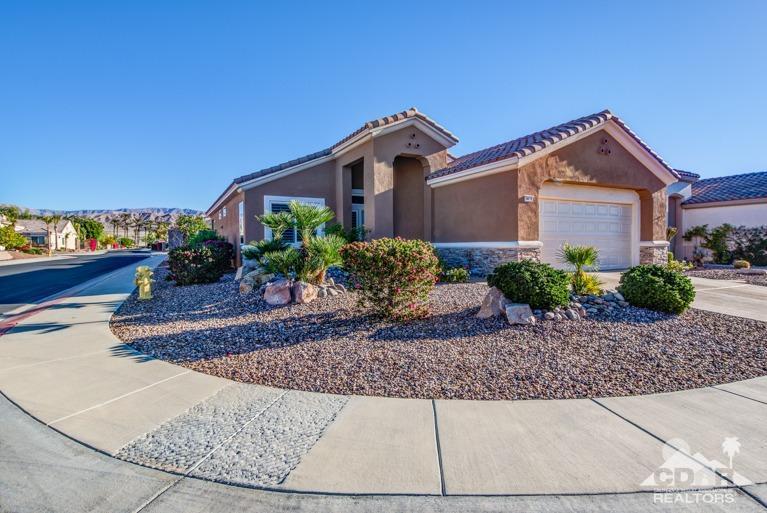 78632 Rainswept Way Palm Desert, CA 92211 - Photo 1 of 20 a front view of a house with garden
