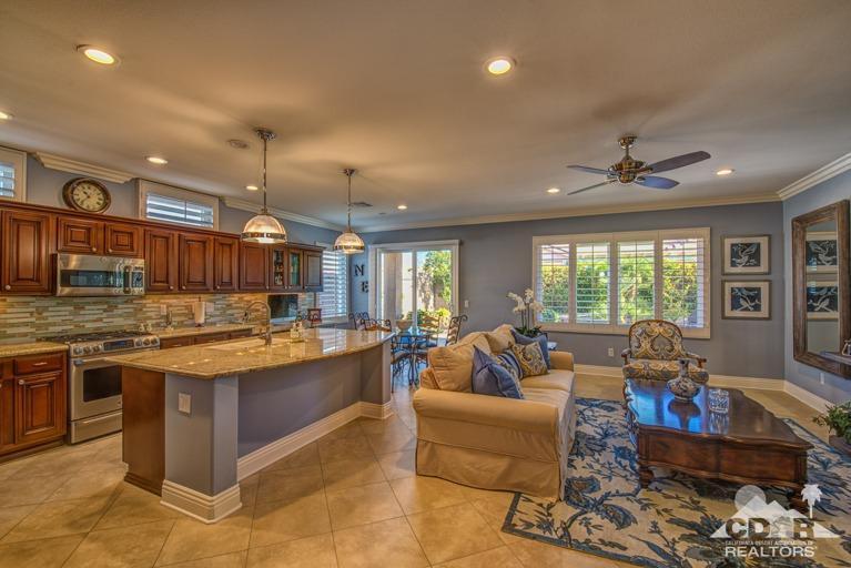 78632 Rainswept Way Palm Desert, CA 92211 - Photo 5 of 20 a living room with stainless steel appliances granite countertop furniture sink and large window