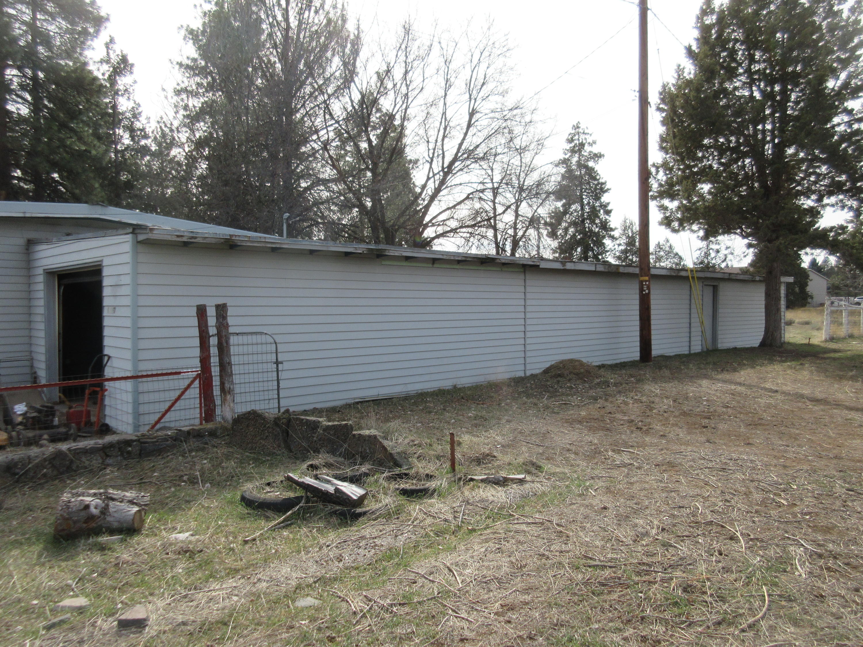 61197 Parrell Road Bend, OR 97702 - Photo 13 of 13 There is a large storage area behind the garage.
