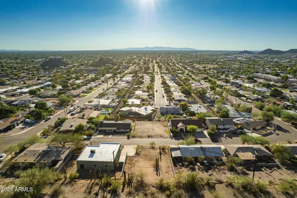 an aerial view of residential building with parking space