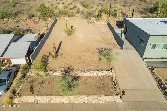 a view of swimming pool with a yard
