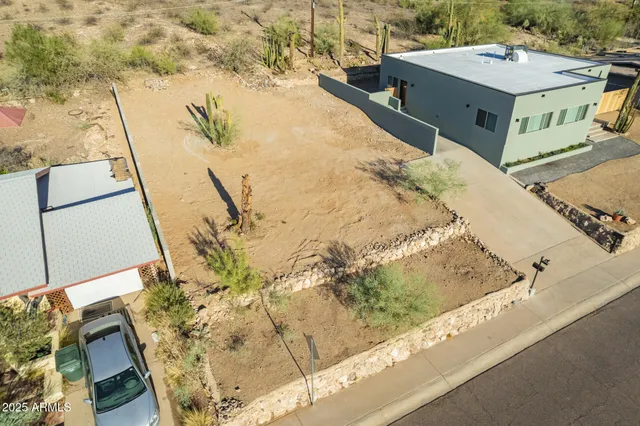 a view of a balcony with chairs