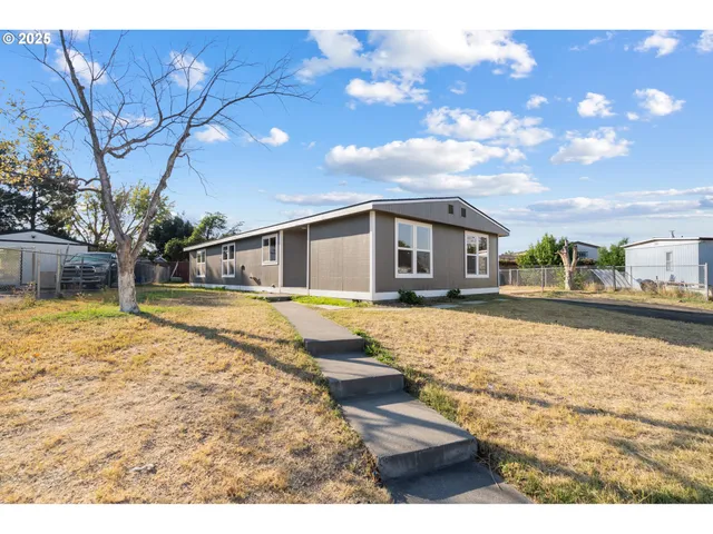 a view of a house with a swimming pool
