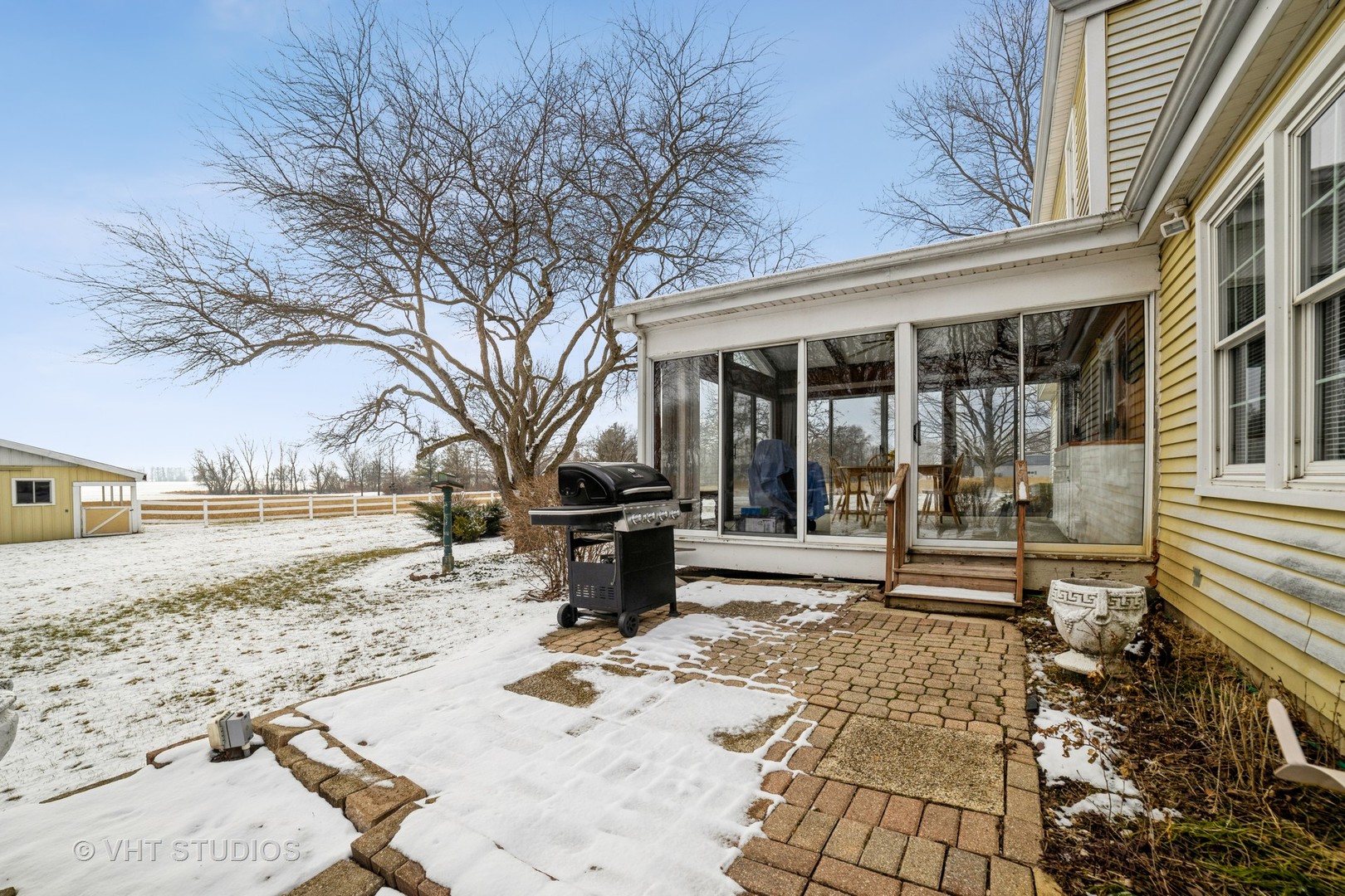 43-w043 Campton Hills Road Elburn, IL 60119 - Photo 17 of 22 a front view of a house with a yard