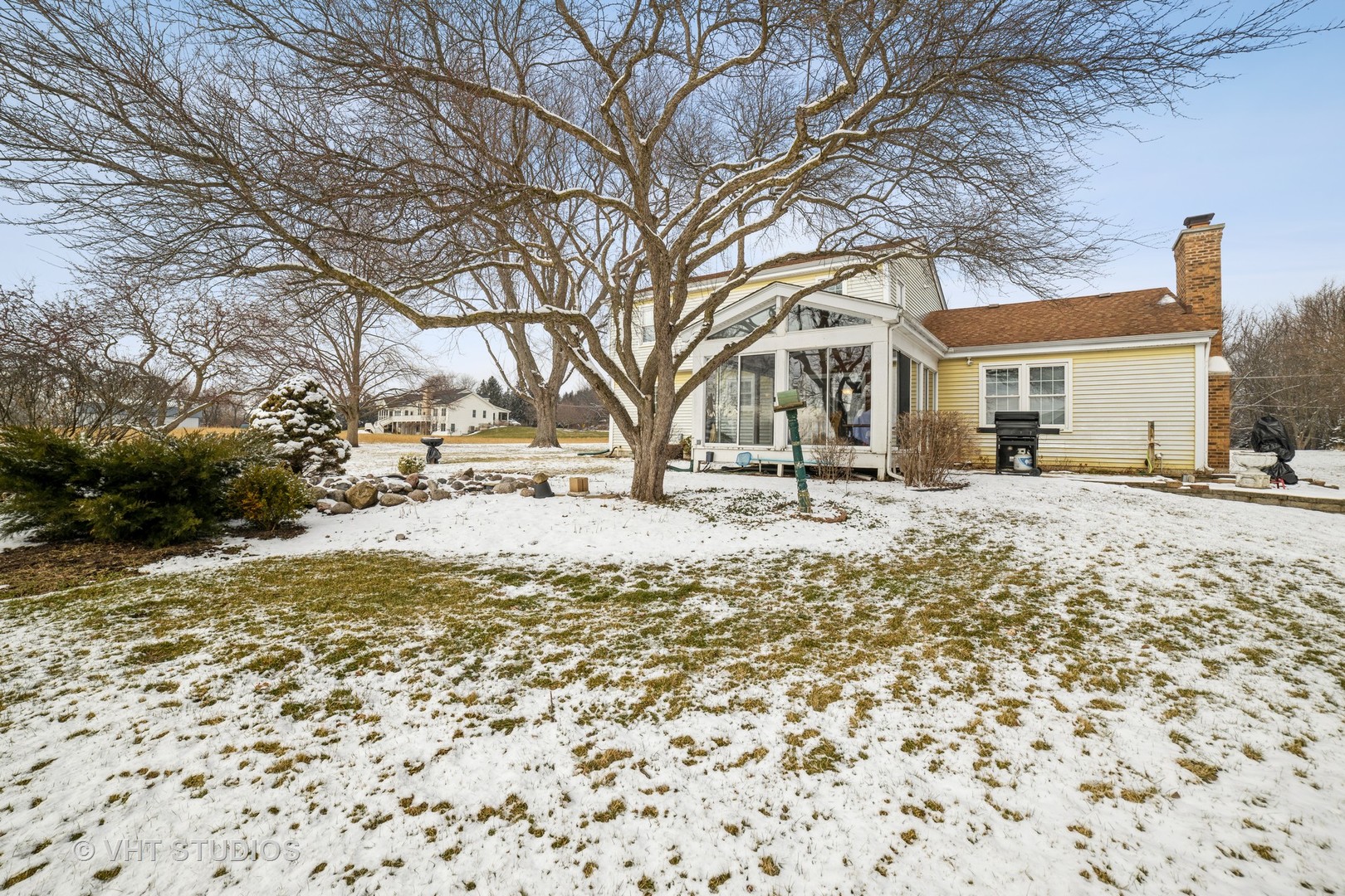 43-w043 Campton Hills Road Elburn, IL 60119 - Photo 20 of 22 a view of road with snow on the house