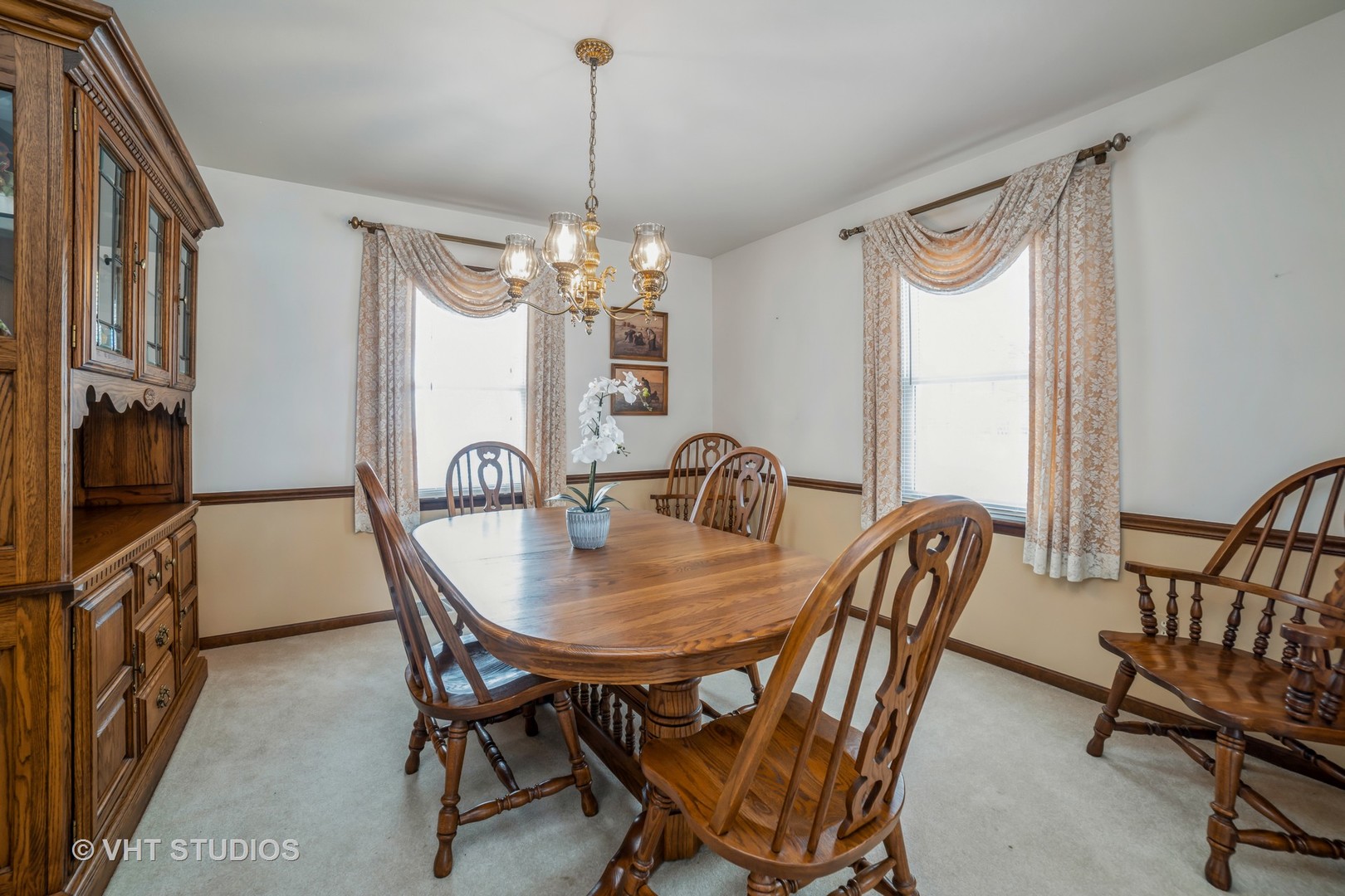 43-w043 Campton Hills Road Elburn, IL 60119 - Photo 4 of 22 a view of a dining room with furniture window and wooden floor