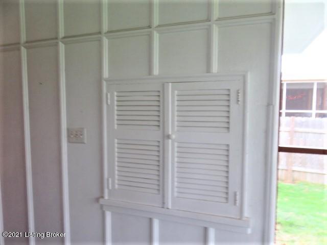 3107 Sherbrooke Road Louisville, KY 40205 - Photo 32 of 34 Portal located inside the screen porch to inside of storage unit...doesn't this just SCREAM Walk-up Bar???? Hawaiian Tropic - here we come!