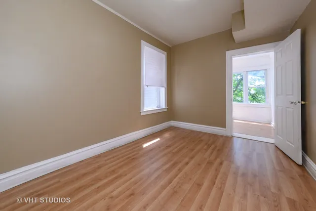 a view of a room that has a window in it