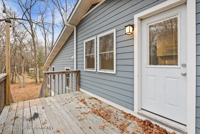a front view of a house with a porch