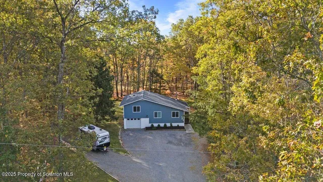 a house view with a garden space