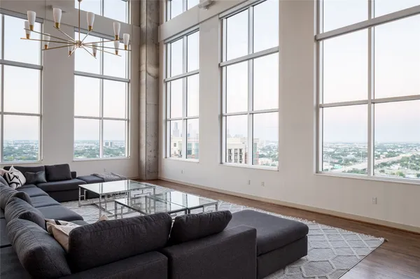a living room with furniture and a window