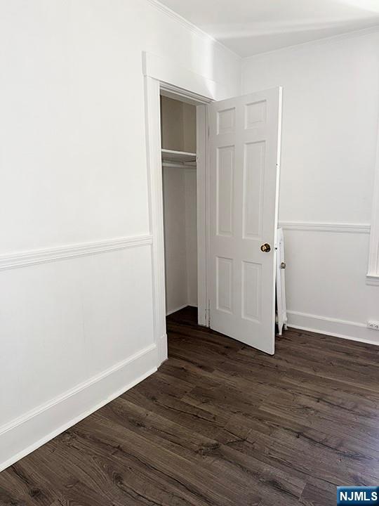 115 West Allendale Avenue, Unit 7 Allendale, NJ 07401 - Photo 4 of 10 an empty room with wooden floor