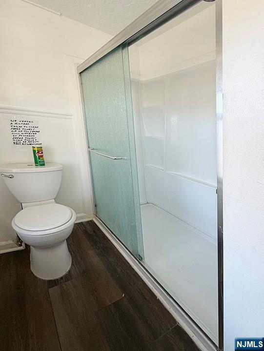 115 West Allendale Avenue, Unit 7 Allendale, NJ 07401 - Photo 6 of 10 a bathroom with a toilet and a shower
