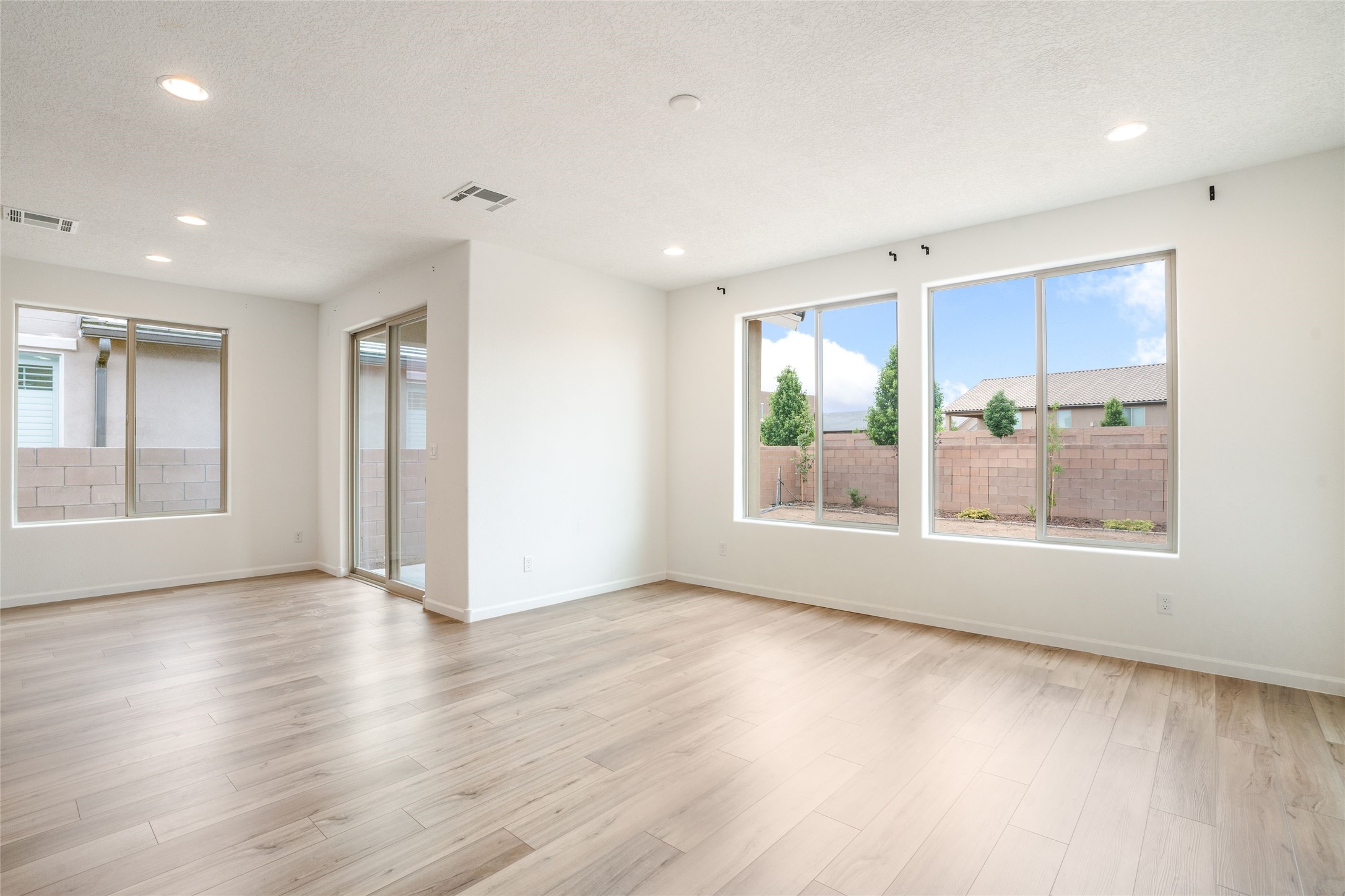 120 Mountaingem Loop Santa Fe, NM 87508 - Photo 11 of 31 Living and Dining Rooms